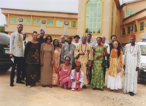 The 10 participants pose with Eze Chukuwemeka Eri in Aguleri, Anambra State Nigeria